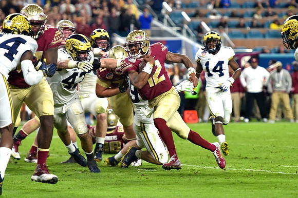 Delano Hill (44), Ben Gedeon (42), and Josh Metellus (14)
