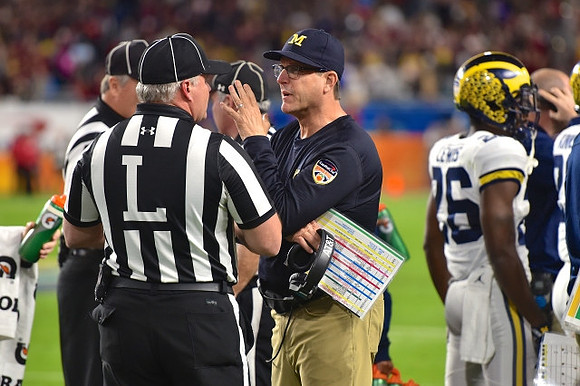 Jim Harbaugh and Jourdan Lewis (26)