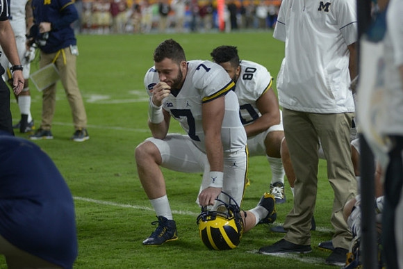 Shane Morris (7) and Khalid Hill (80)