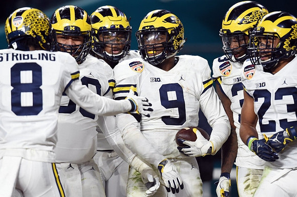 Channing Stribling (8), Mike McCray (9), and Tyree Kinnel (23)
