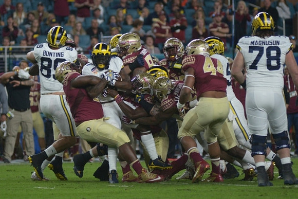 Ian Bunting (89), De'Veon Smith (4), and Erik Magnuson (78)