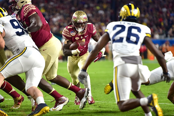Matthew Godin (99) and Jourdan Lewis (26)