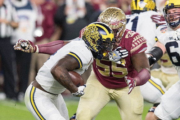 De'Veon Smith (4) and Kyle Kalis (67)