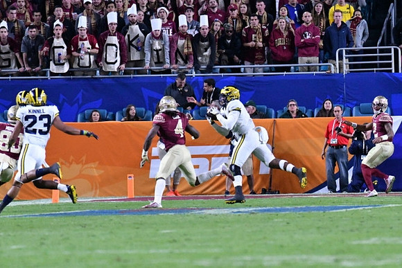 Tyree Kinnel (23) and Jourdan Lewis (26)