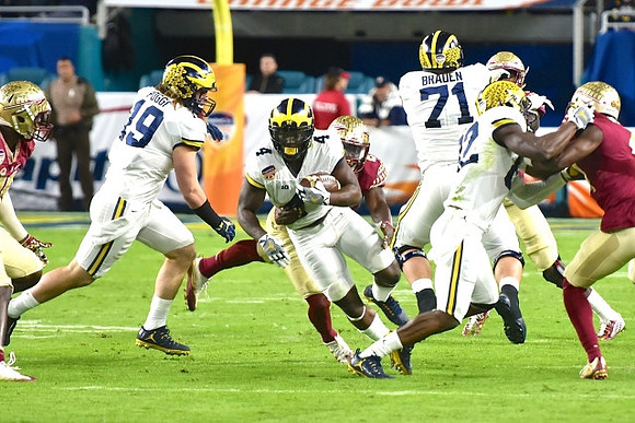 Henry Poggi (19), De'Veon Smith (4), Ben Braden (71), and Amara Darboh (82)