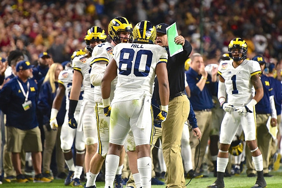 Khalid Hill (80), Wilton Speight (3), Jim Harbaugh, and Kekoa Crawford (1)