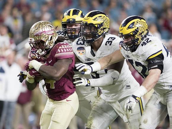 Ryan Glasgow (96), Taco Charlton (33), and Ben Gedeon (42)