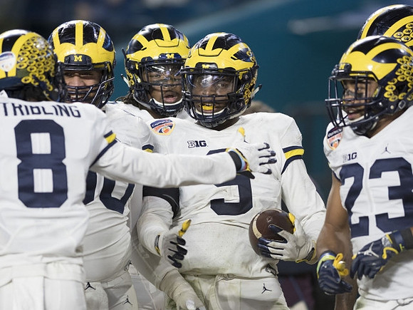 Channing Stribling (8), Mike McCray (9), and Tyree Kinnel (23)