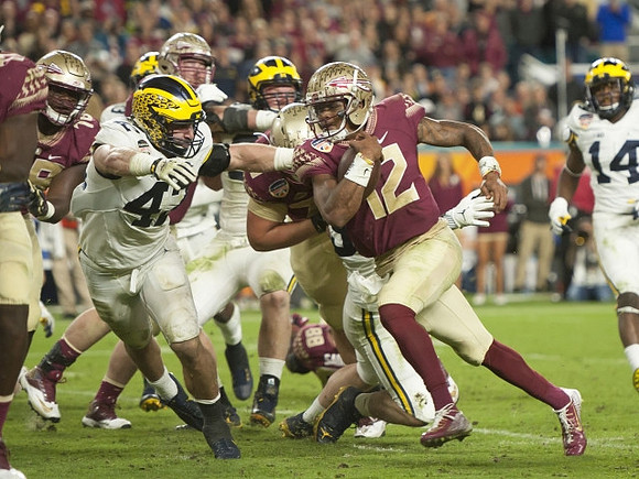 Ben Gedeon (42) and Josh Metellus (14)