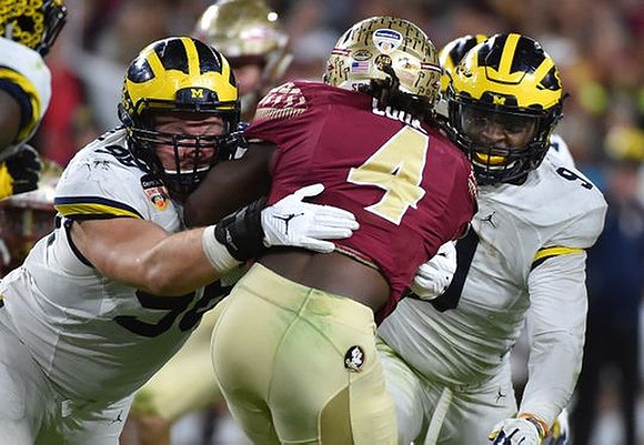 Ryan Glasgow (96) and Mike McCray (9)