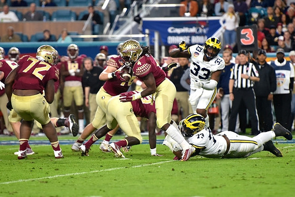 Taco Charlton (33) and Maurice Hurst (73)