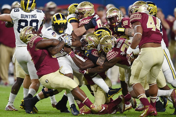 Ian Bunting (89) and De'Veon Smith (4)