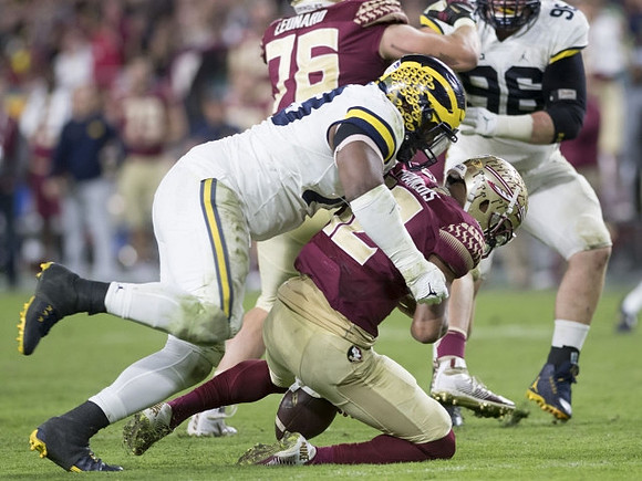 Taco Charlton (33) and Ryan Glasgow (96)