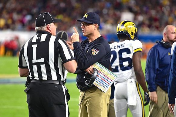 Jim Harbaugh and Jourdan Lewis (26)