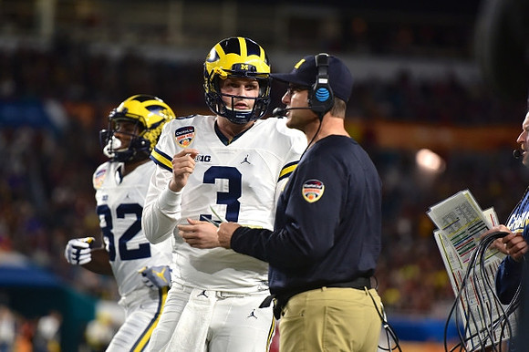 Amara Darboh (82), Wilton Speight (3), and Jim Harbaugh