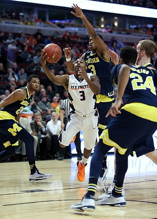 Zak Irvin (21), Kameron Chatman (3), and Aubrey Dawkins (24)