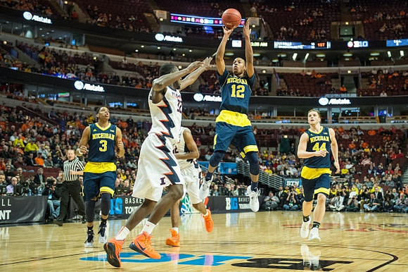 Kameron Chatman (3), Muhammad-Ali Abdur-Rahkman (12), and Max Bielfeldt (44)