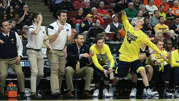 Sean Lonergan (20), Andrew Dakich (11), and Mark Donnal (34)