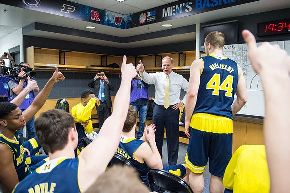 John Beilein, Max Bielfeldt (44), and Michigan Team