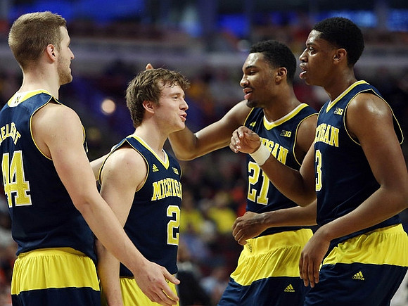 Max Bielfeldt (44), Spike Albrecht (2), Zak Irvin (21), and Kameron Chatman (3)