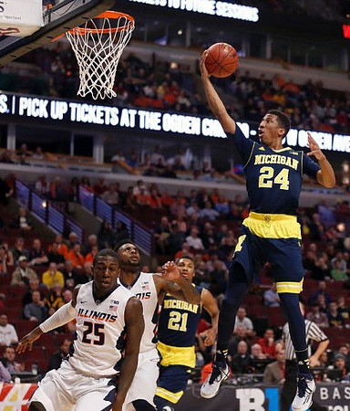 Zak Irvin (21) and Aubrey Dawkins (24)
