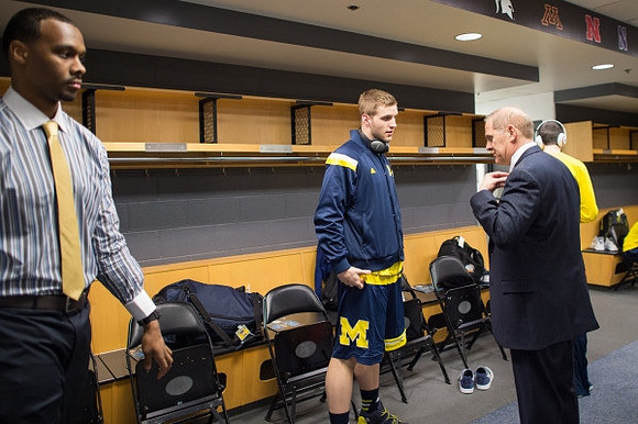 Muhammad-Ali Abdur-Rahkman (12), Max Bielfeldt (44), and John Beilein