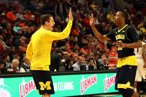 Andrew Dakich (11) and Muhammad-Ali Abdur-Rahkman (12)