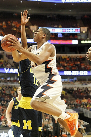 Spike Albrecht (2) and Muhammad-Ali Abdur-Rahkman (12)