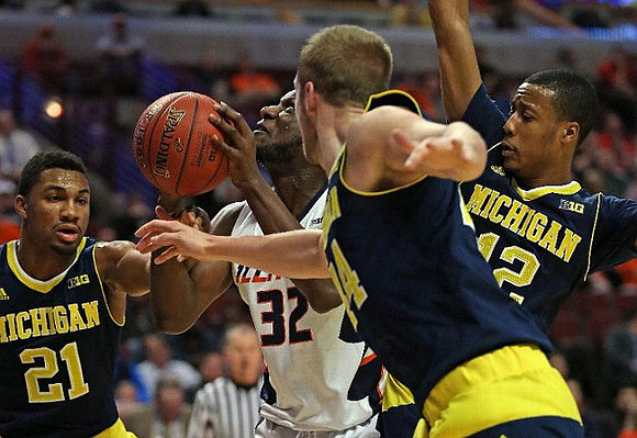 Zak Irvin (21), Max Bielfeldt (44), and Muhammad-Ali Abdur-Rahkman (12)