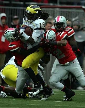 Denard Robinson (16)