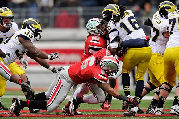 Stephen Hopkins (33), Denard Robinson (16), Elliott Mealer (57), and Michael Schofield (75)