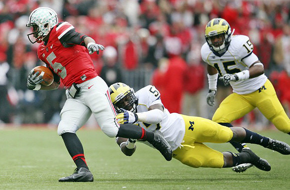 Frank Clark (57) and James Ross (15)