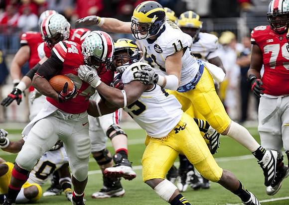 Kenny Demens (25) and Jordan Kovacs (11)