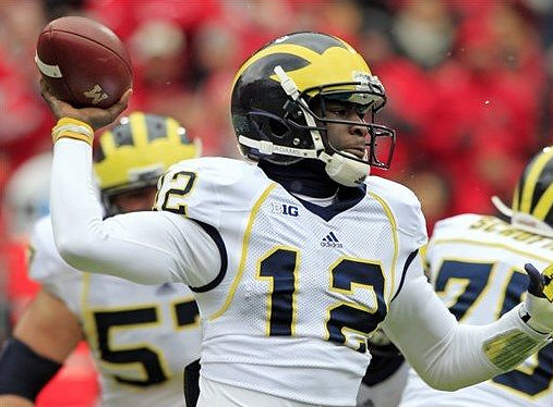 Devin Gardner (12), Elliott Mealer (57), and Michael Schofield (75)