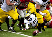 Devin Gardner (12) and Elliott Mealer (57)