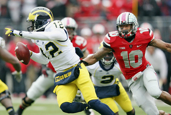 Devin Gardner (12) and Vincent Smith (2)