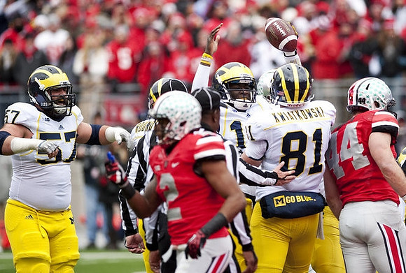 Elliott Mealer (57), Mike Kwiatkowski (81), Roy Roundtree (21), and Devin Gardner (12)