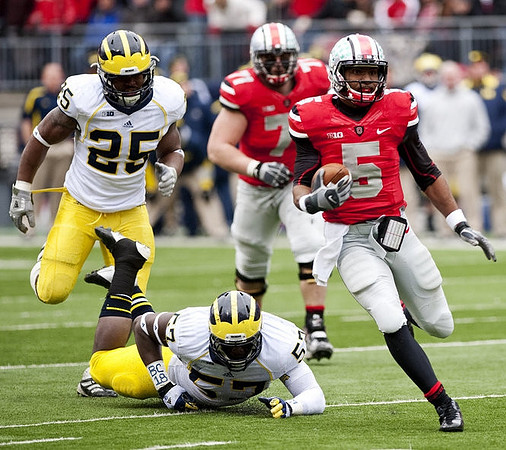 Kenny Demens (25) and Frank Clark (57)