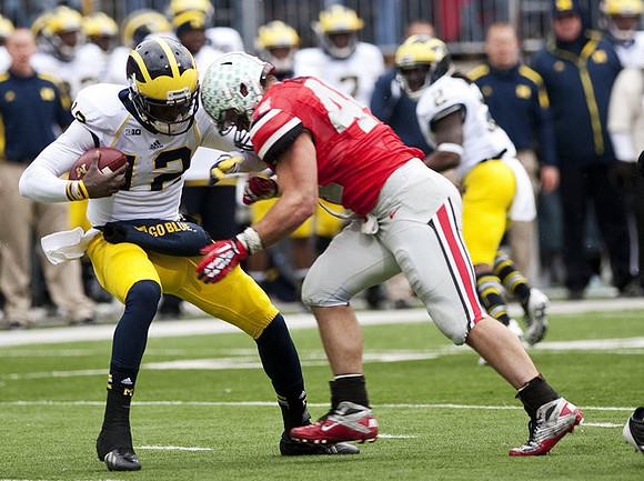 Denard Robinson (16) and Vincent Smith (2)
