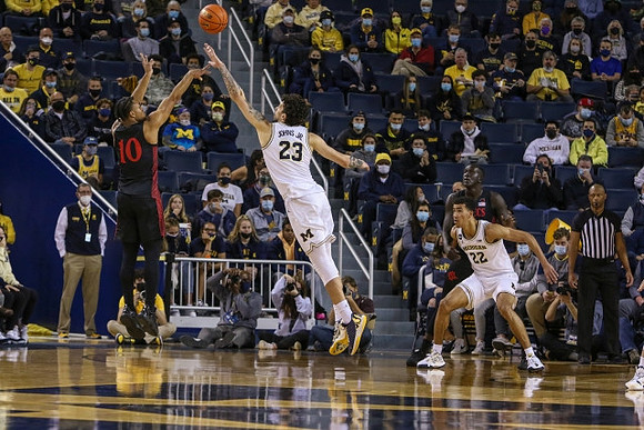 Brandon Johns Jr. (23) and Caleb Houstan (22)