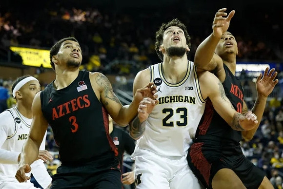 Terrance Williams II (5) and Brandon Johns Jr. (23)