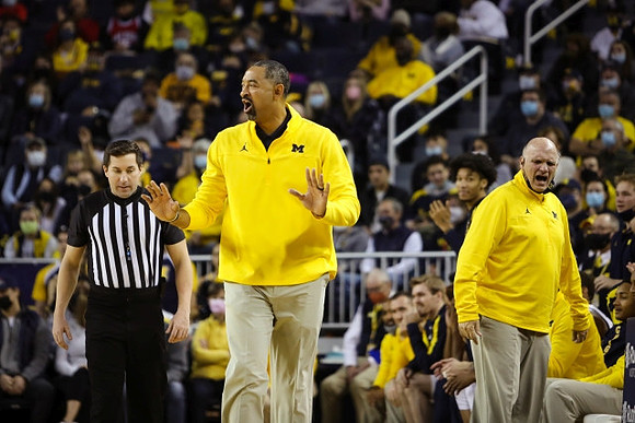 Juwan Howard and Phil Martelli