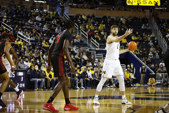 Hunter Dickinson (1) and Moussa Diabate (14)