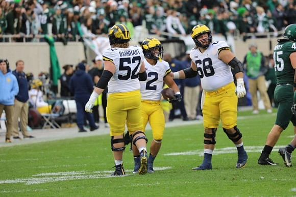 Karsen Barnhart (52), Blake Corum (2), and Andrew Vastardis (68)