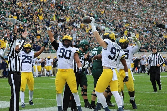 Junior Colson (25), Mike Morris (90), Aidan Hutchinson (97), and Christopher Hinton (15)