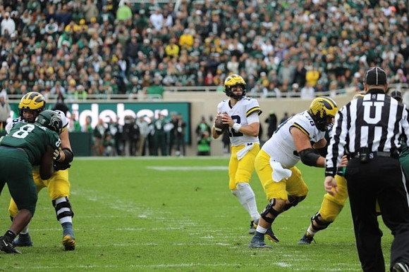Cade McNamara (12) and Andrew Vastardis (68)
