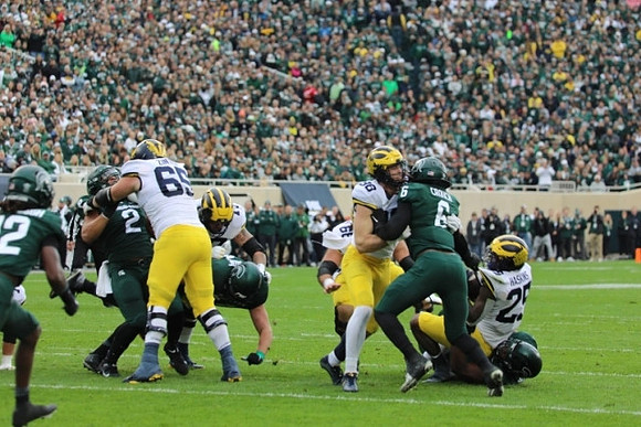 Zak Zinter (65), Luke Schoonmaker (86), and Hassan Haskins (25)