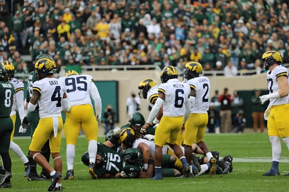 David Ojabo (55), Vincent Gray (4), Donovan Jeter (95), R.J. Moten (6), Brad Hawkins (2), and Aidan Hutchinson (97)