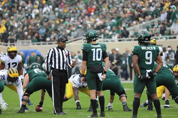Josh Ross (12), Donovan Jeter (95), and Mazi Smith (58)