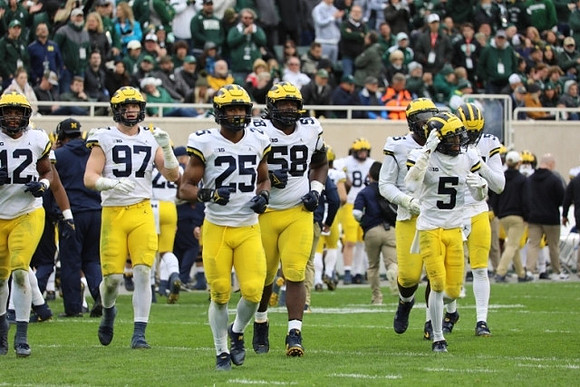 Josh Ross (12), Aidan Hutchinson (97), Junior Colson (25), Mazi Smith (58), and DJ Turner (5)